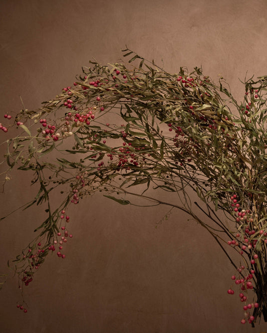 Add cheery pepper berries to any decoration, from wreaths to gifts, for a playful and fun touch.